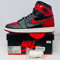 Jordan 1 Retro High Bred Banned 2016 sneaker on Nike box with extra laces
