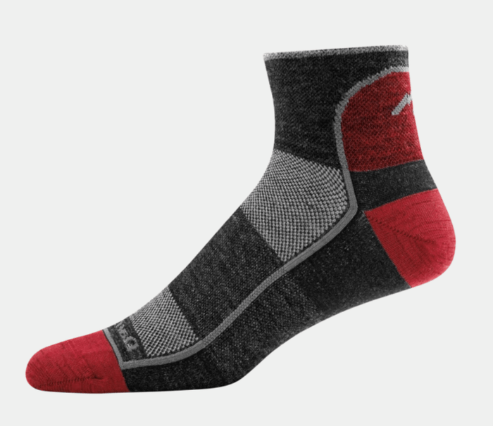 Darn Tough 1/4 Sock Light socks in black, gray, and red with reinforced heel and toe, side view.