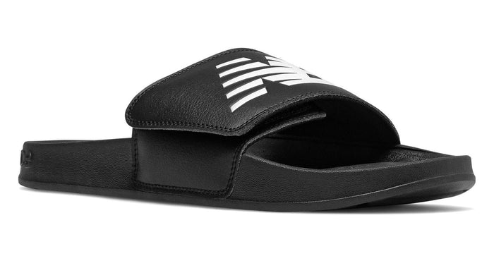 New Balance 200 Adjustable sandals in black with a textured sole and adjustable strap featuring white branding, side angle view.