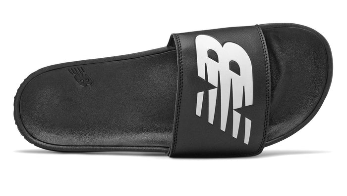 New Balance 200 Adjustable slides in black with bold white logo on synthetic strap, top view showing cushioned footbed and contoured sole.