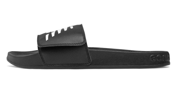 New Balance 200 Adjustable sandals in black with synthetic strap featuring white logo text and contoured footbed, side view.