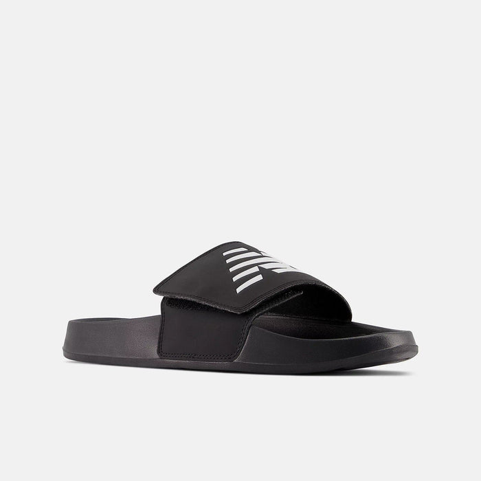 New Balance 200v2 Adjustable slides in black with white branding, adjustable strap and cushioned sole, angled side view.