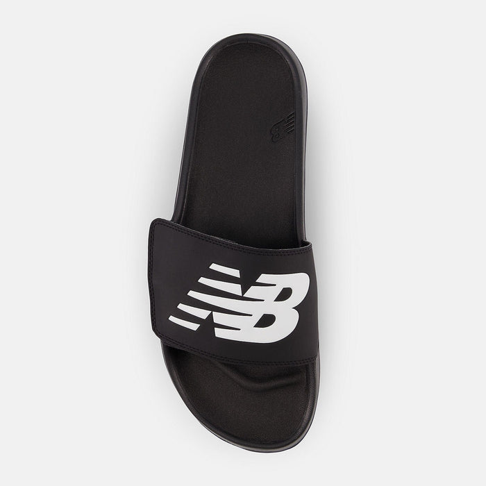 New Balance 200v2 Adjustable slide sandals in black with large white logo, top view showing cushioned footbed and adjustable strap