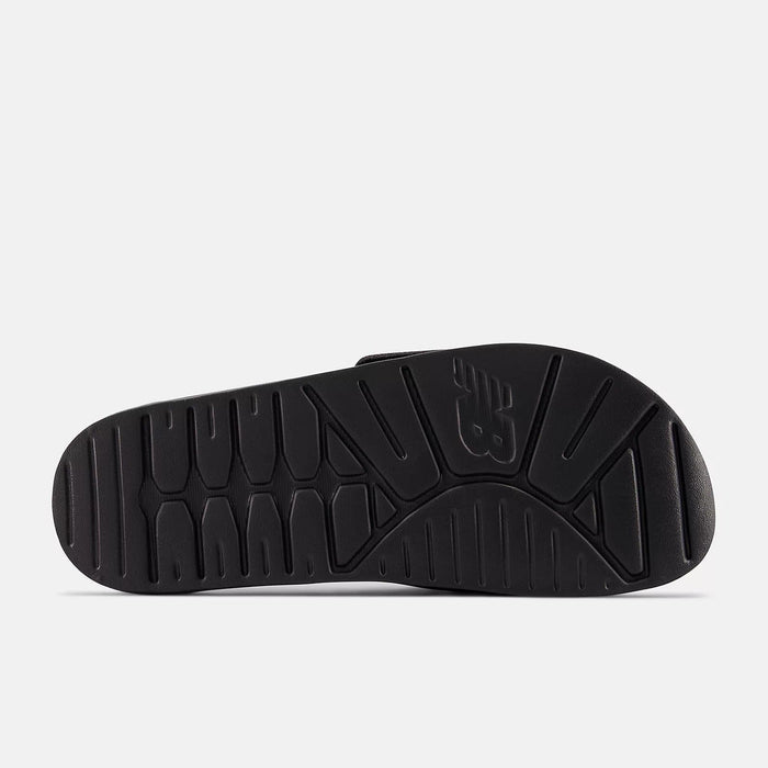 New Balance 200v2 Adjustable sandals outsole in black with textured grip and embossed logo, bottom view.