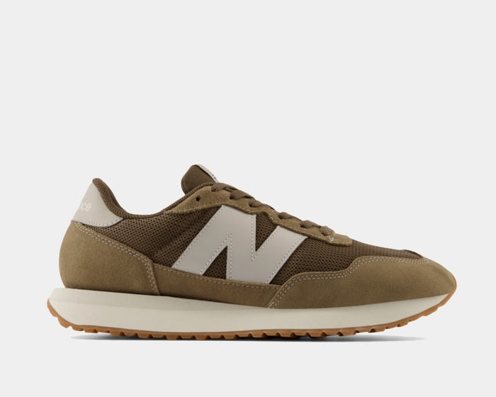 New Balance 237 V1 lifestyle sneakers in olive green suede and mesh with white side logo and gum outsole, side view.