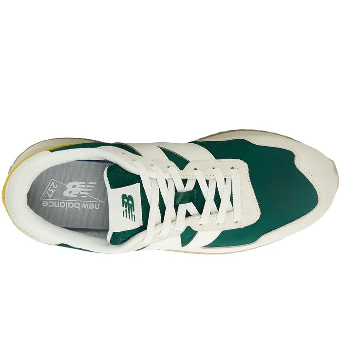 New Balance 237 V1 sneakers in green and white with suede and mesh upper, lace-up closure, and branded insole, top view.