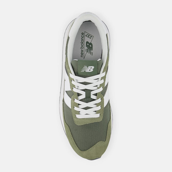 New Balance 237 sneakers in olive green with white accents, featuring a breathable upper and lace-up closure, top view.