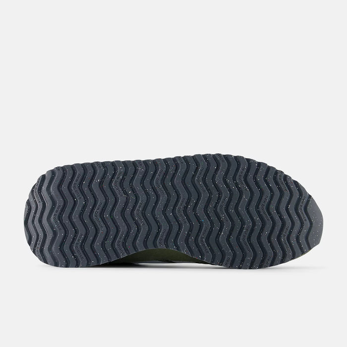 New Balance 237 sneakers outsole in dark gray rubber with wavy tread pattern and speckled design, sole/bottom view.