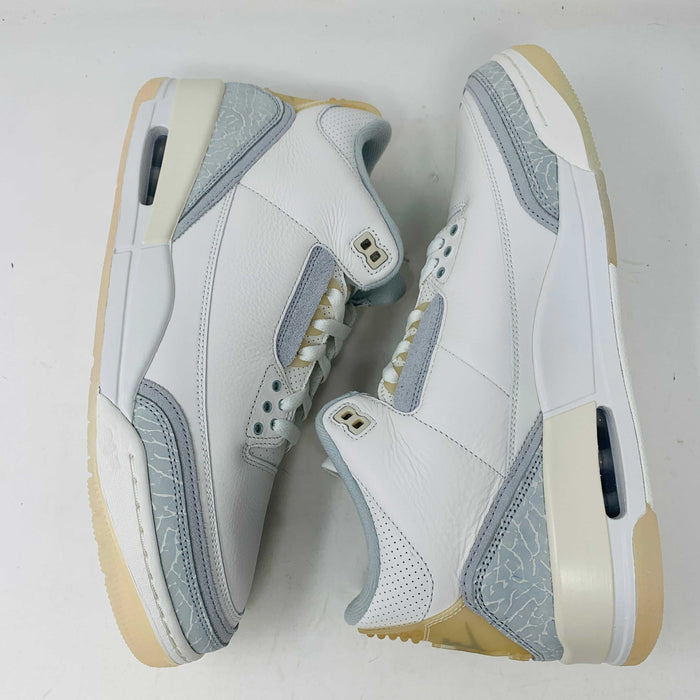 Jordan 3 Retro Craft Ivory sneakers with classic logo and sleek design.