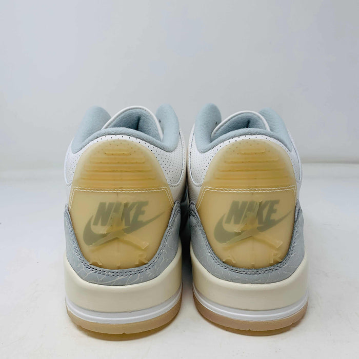 Jordan 3 Retro Craft Ivory sneakers with classic Nike logo on heel.