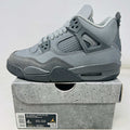 Jordan 4 Retro SE Paris Olympics Wet Cement GS sneaker in grey on box, 2024 edition