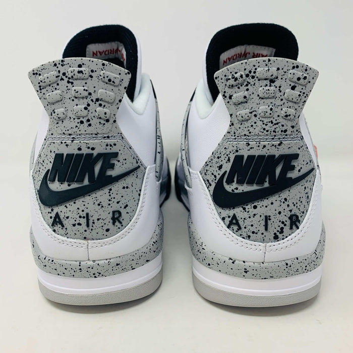 Check out the Jordan 4 White Cement 2016, a white sneaker with black and gray speckles. It features a small red jumping logo, comes in a matching box, and includes the classic 2016 Jordan hang tag for authenticity.