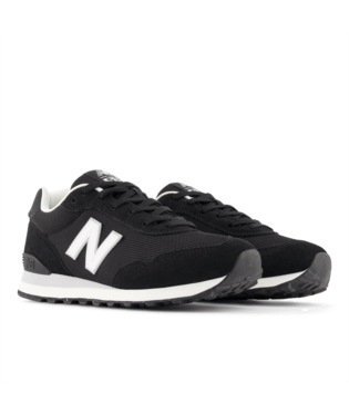 New Balance 515 v3 sneakers in black with white logo, suede and mesh upper, angled front-side view.