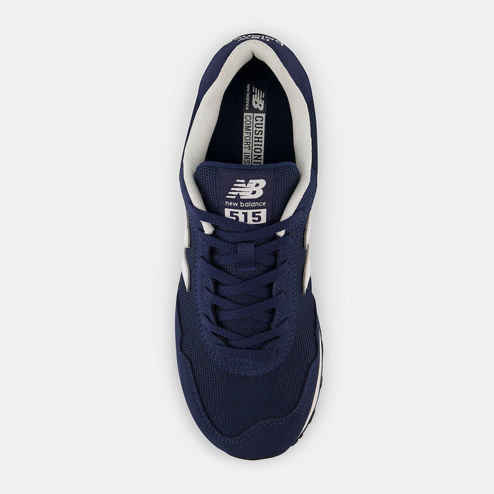 New Balance 515 v3 sneakers top view in navy blue with mesh upper, lace-up closure, and white cushioned interior.