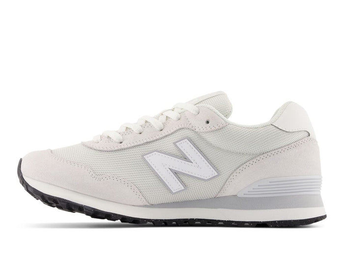 New Balance 515 v3 lifestyle sneakers in off-white mesh and suede with gray accents and black outsole, side view.