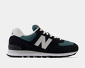 New Balance 574 shoes in black, teal, and white with suede overlays, mesh panels, and ENCAP midsole, side view.