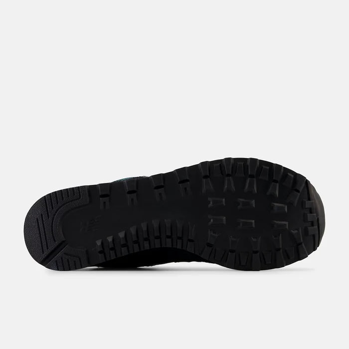 New Balance 574 shoes outsole in black rubber with textured tread pattern for grip and durability, bottom view.