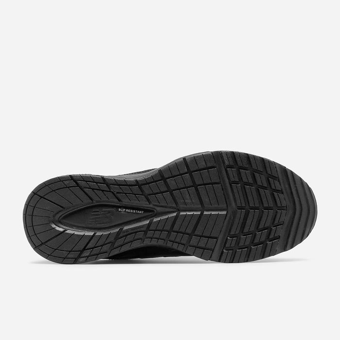 New Balance 608v5 Slip Resistant outsole in black rubber with slip-resistant tread pattern, bottom view.
