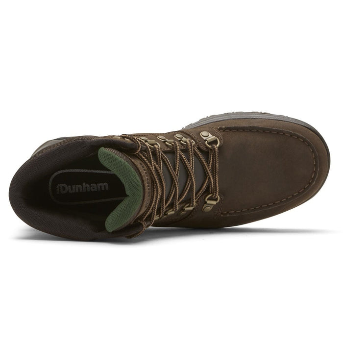 Dunham 8000Works Moc Boot top view showing brown leather upper, moc toe stitching, metal eyelets, and green padded tongue.
