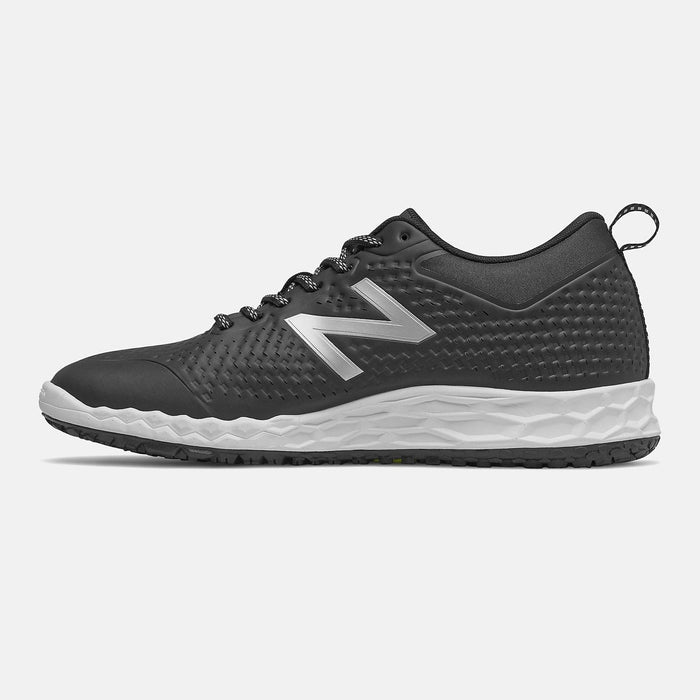 New Balance 806v1 shoes in black with silver logo, perforated upper design, and white textured midsole, side view.