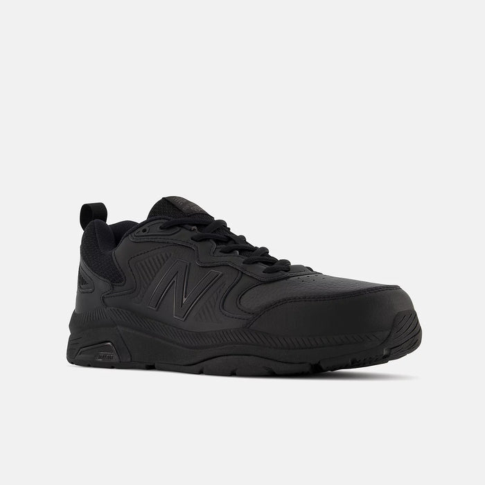New Balance 857v3 Slip Resistant shoes in black with durable leather upper and slip-resistant outsole, front-side view.