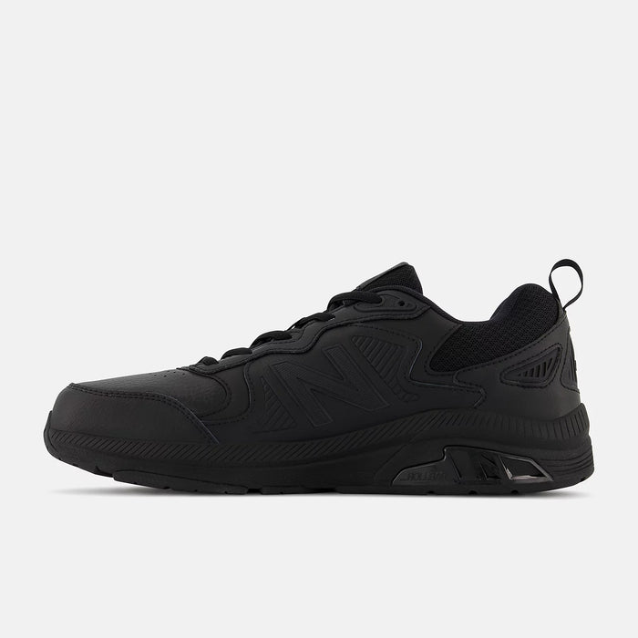 New Balance 857v3 Slip Resistant shoes in all-black with durable leather upper, mesh panels, and slip-resistant outsole, side view.