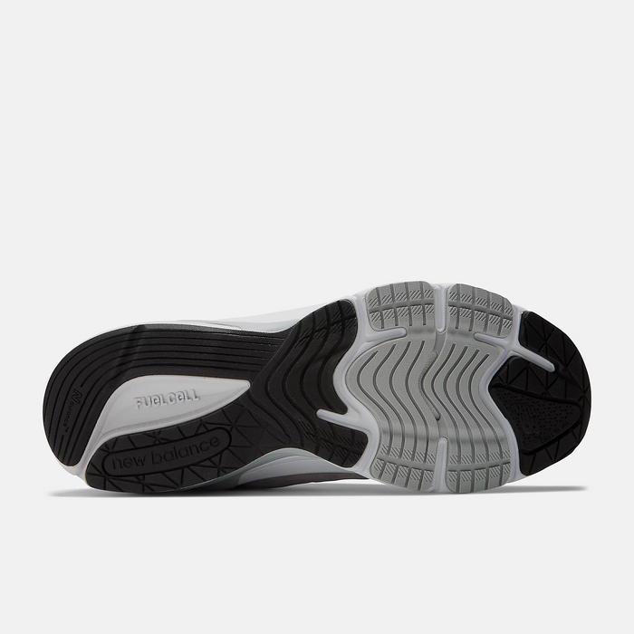 New Balance 990v6 running shoes outsole showcasing FuelCell cushioning and multidirectional tread pattern in black and gray rubber.