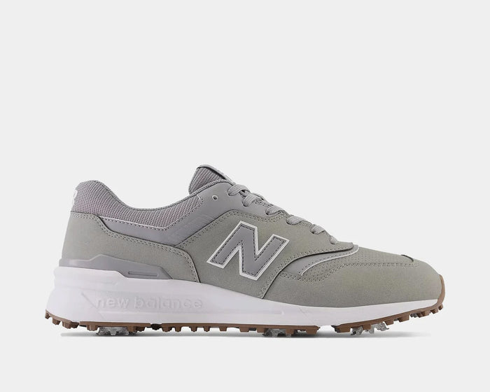 New Balance Golf 997 Golf shoes in light gray with synthetic upper, white midsole, and spiked outsole, side view.