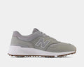 New Balance Golf 997 Golf shoes in light gray with synthetic upper, white midsole, and spiked outsole, side view.