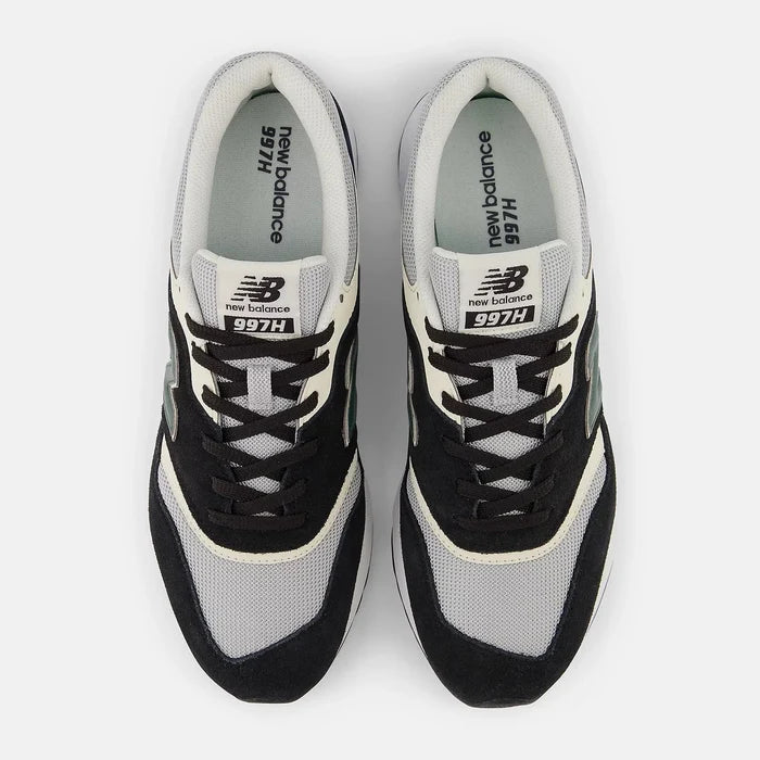 New Balance 997H sneakers top view featuring gray mesh upper, black suede overlays, cream accents, and branded tongue detailing.
