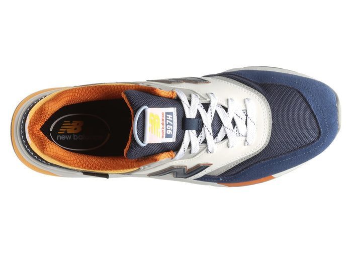 New Balance 997H sneakers in navy blue, white, and orange with a mesh upper, leather overlays, and white laces, top view.