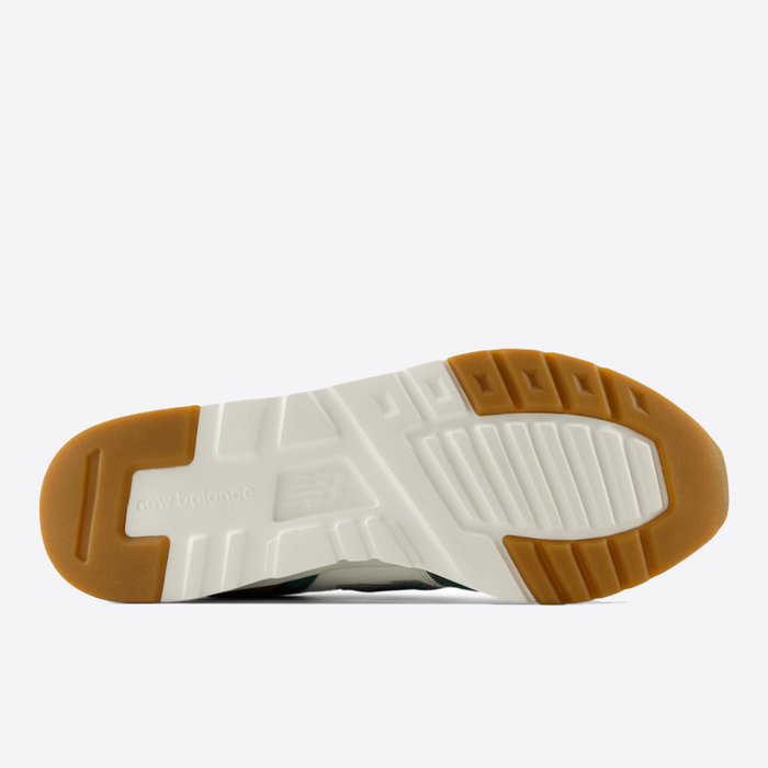 New Balance 997H sneakers outsole with textured gum rubber and white midsole, bottom view highlighting tread design.