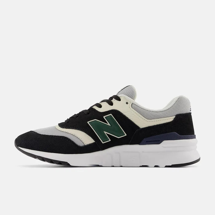 New Balance 997H sneakers in black, cream, and gray with green "N" logo, side profile view showing suede and mesh material.