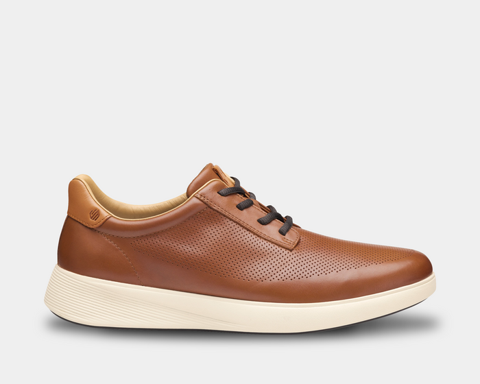 Johnston & Murphy Ackerson Perfed Plain Toe shoes in tan leather with perforated detailing and white outsole, side view.