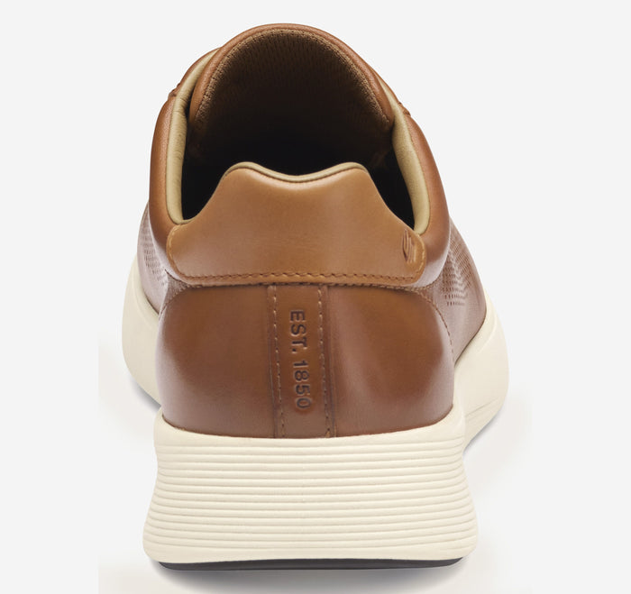 Johnston & Murphy Ackerson Perfed Plain Toe shoes in tan leather with embossed detailing and white rubber sole, back view.