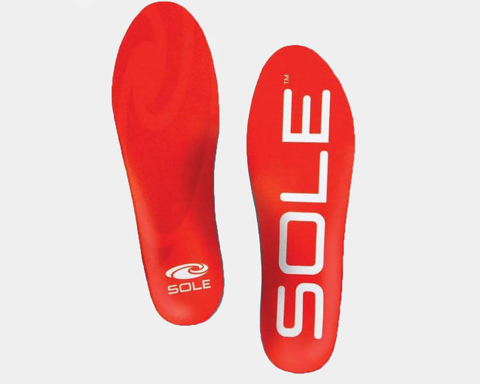Sole Active Medium insoles in bright red with arch support, Sole logo on heel and bold branding, top view showing pair.