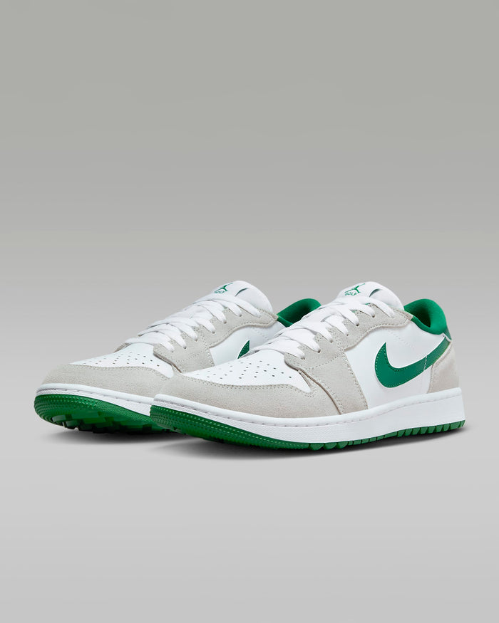 Nike Air Jordan 1 Low G sneakers in white and green featuring suede overlays, perforated toe box, and green rubber outsole, front angle view.