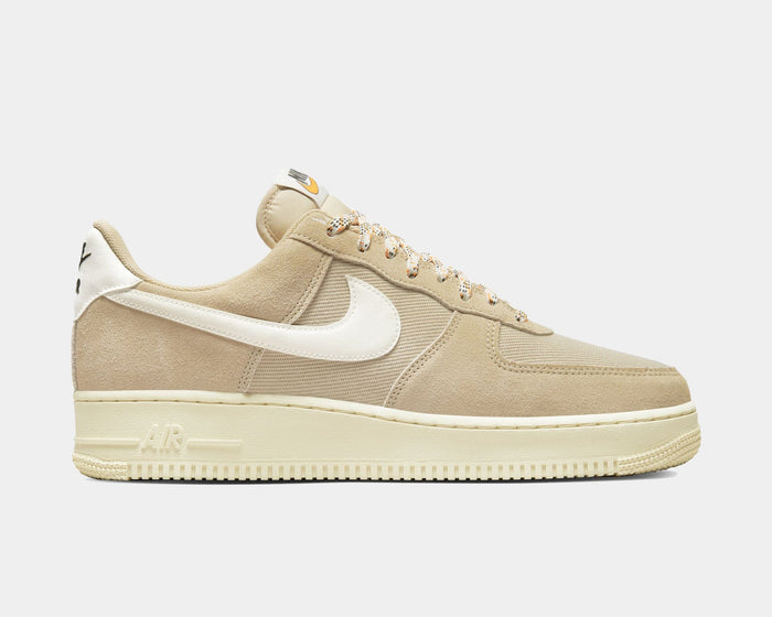 Nike Air Force 1 '07 LV8 sneakers in beige with suede and mesh upper, white leather Swoosh, and textured midsole, side view.