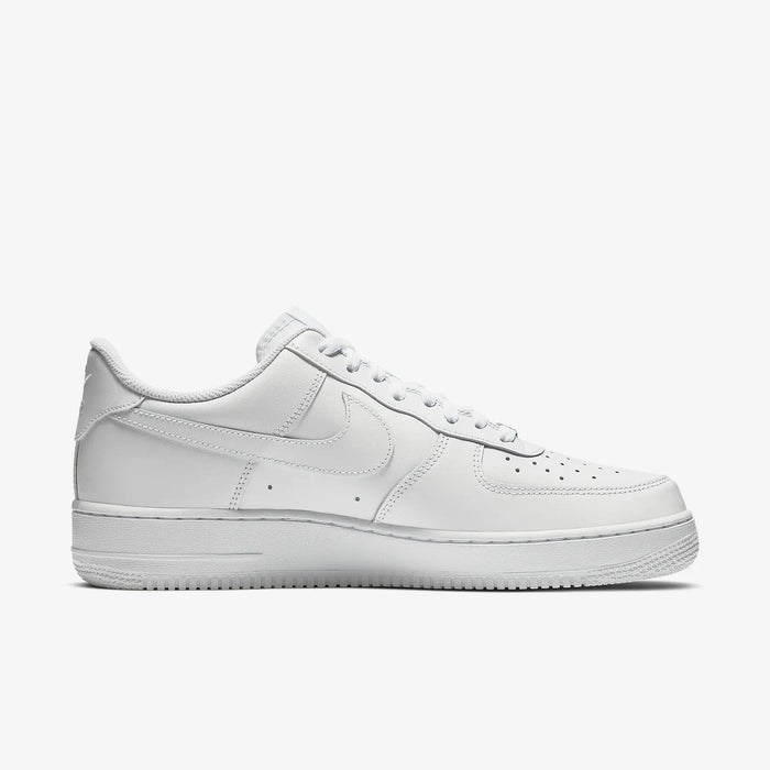 Nike Air Force 1 '07 sneakers in white leather with perforated toe box and signature Nike Swoosh, side view.