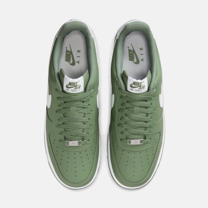 Nike Air Force 1 '07 shoes in moss green with perforated toe box, white Nike Air logo on tongue, and lace-up closure, top view.
