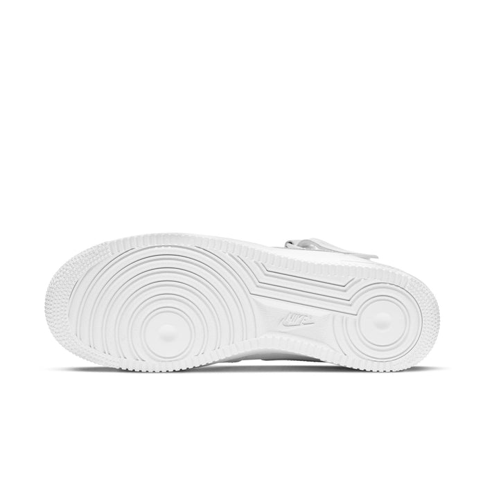 Nike Air Force 1 Mid '07 outsole in white rubber with circular traction pattern and embossed Nike logo, bottom view.