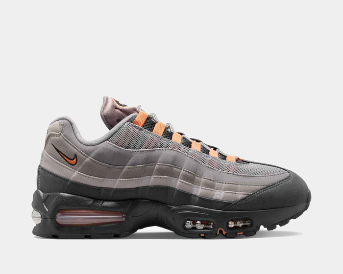 Nike Air Max 95 Big Bubble "OG" sneakers, gray and black with orange accents, side view showing visible air units.