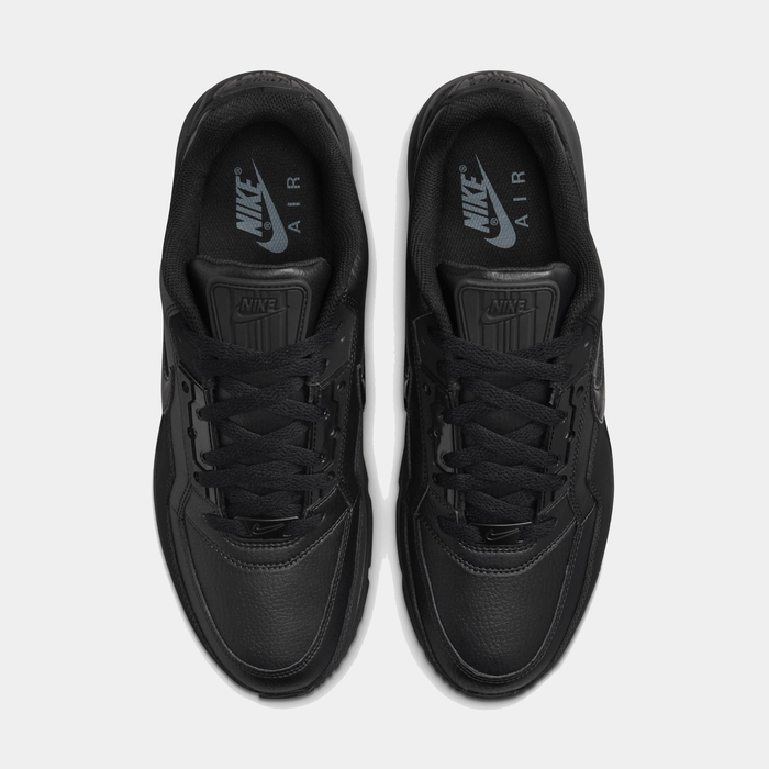 Black Nike Air sneakers on a white background