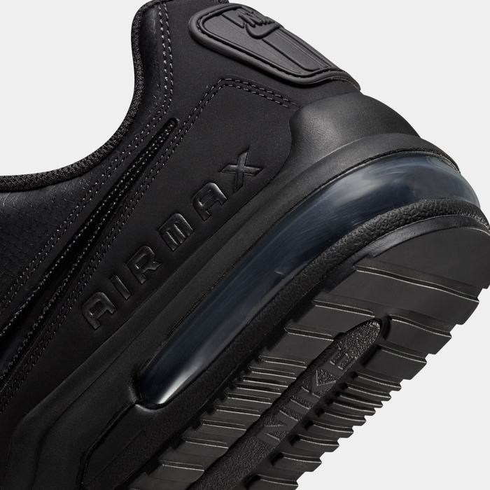 Black sneaker with 'Air Max' branding on a white background
