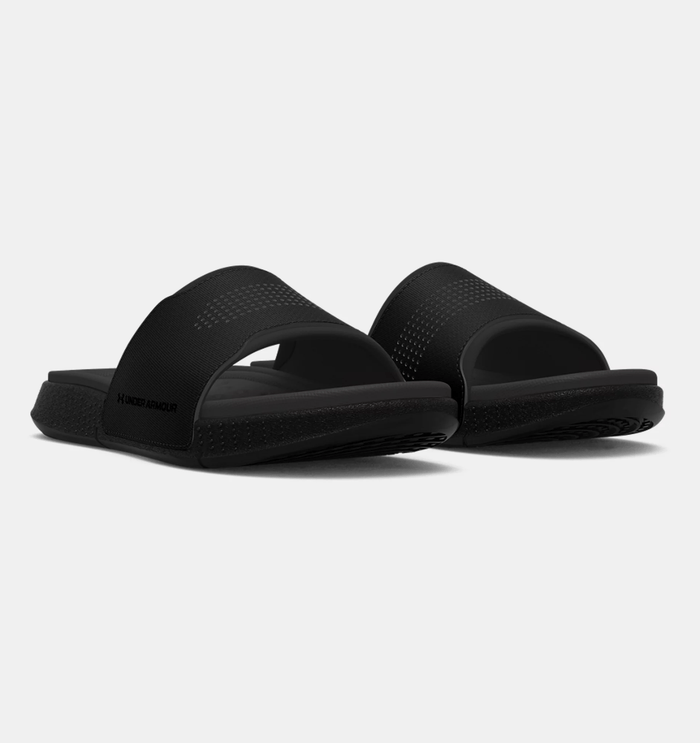 Under Armour Ansa Elevate slides in black with textured footbed and perforated strap design, front angled view.
