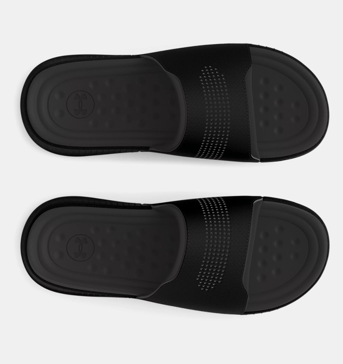 Under Armour Ansa Elevate sandals in black with textured footbed and perforated strap design, top view.