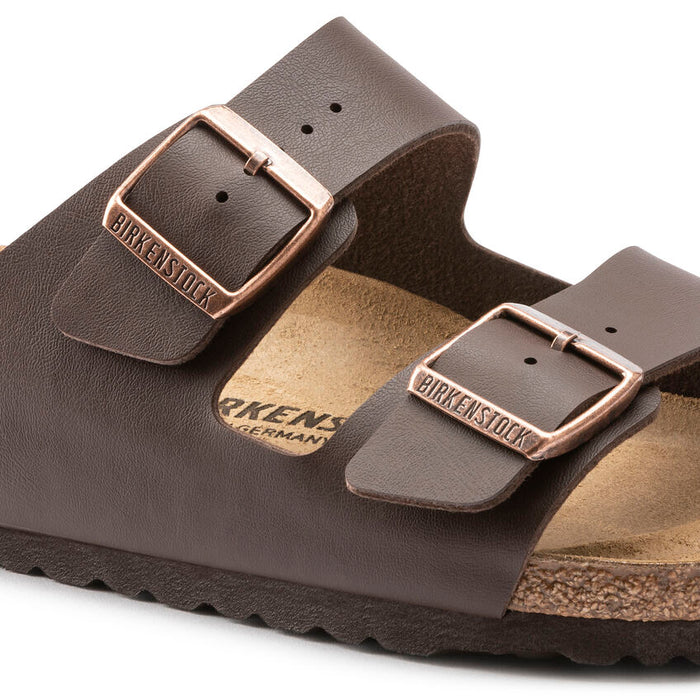 Birkenstock Arizona Birko-Flor® sandals in mocha brown with adjustable straps and copper-tone buckles, close-up side view.