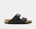 Birkenstock Arizona Soft Footbed Birko-Flor® sandals in black with double adjustable straps and cork-latex footbed, side view.