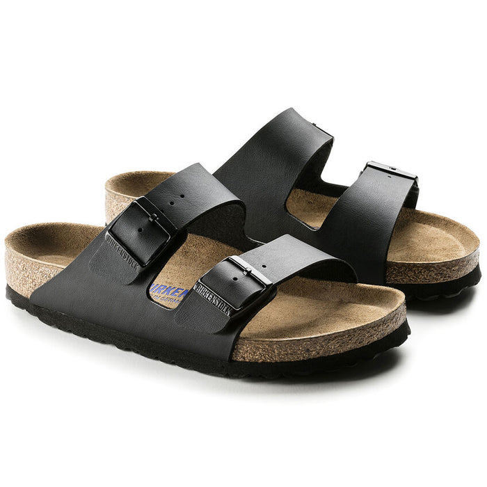 Birkenstock Arizona Soft Footbed Birko-Flor® sandals in black with adjustable buckled straps and cushioned cork footbed, angled side view.