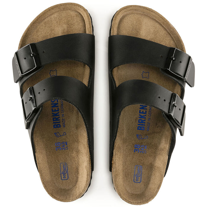 Birkenstock Arizona Soft Footbed Birko-Flor® sandals in black with adjustable buckle straps and contoured cork footbed, top view.